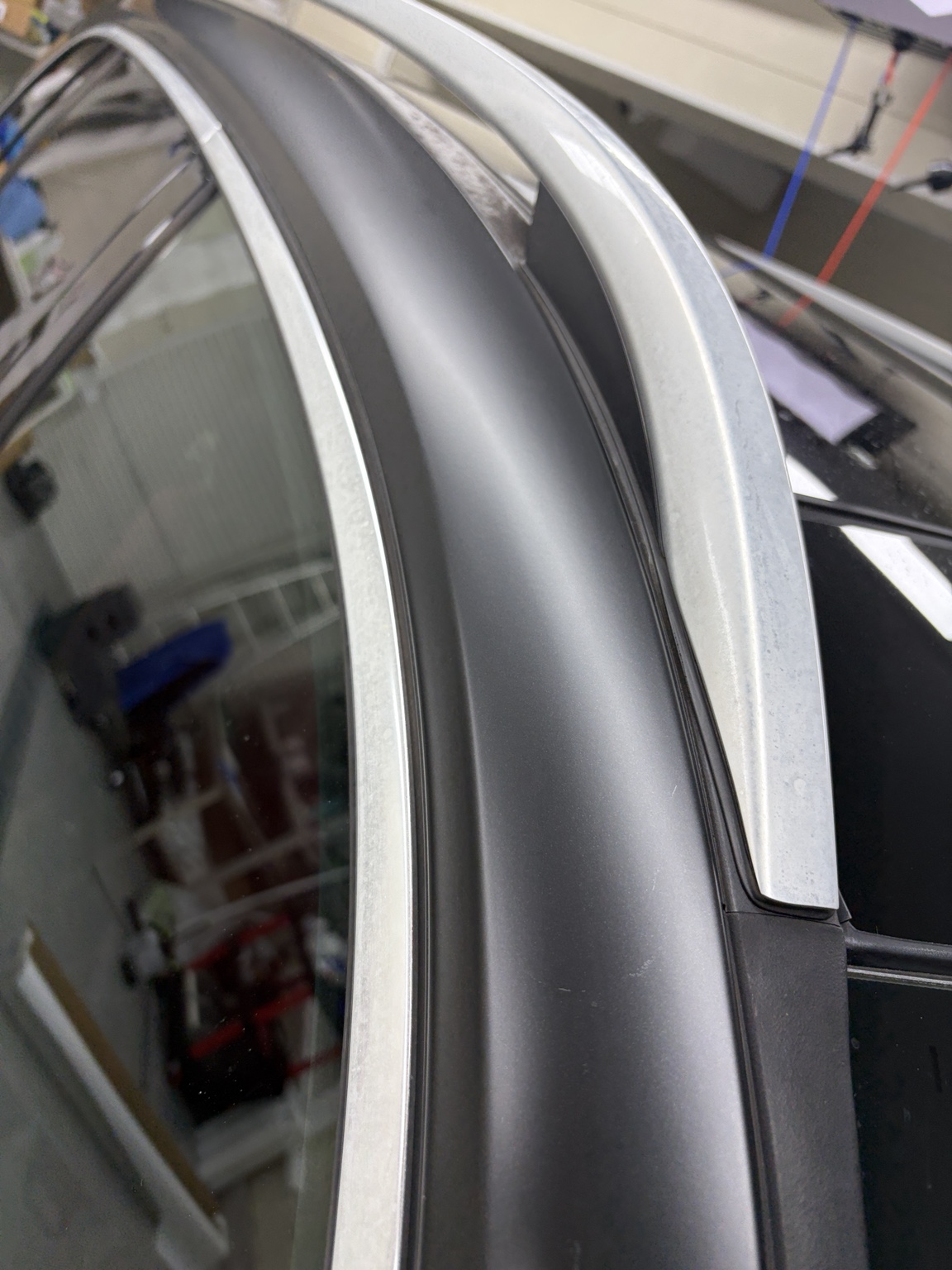 Close-up of white corrosion and spotting on Mercedes GLB window trim