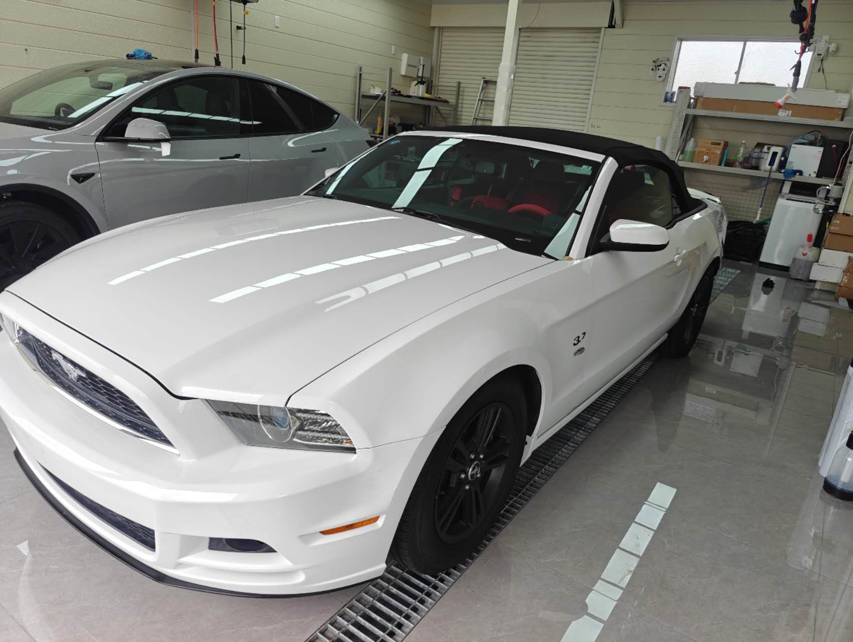 Ford Mustang white exterior before wrapping, front three-quarter view
