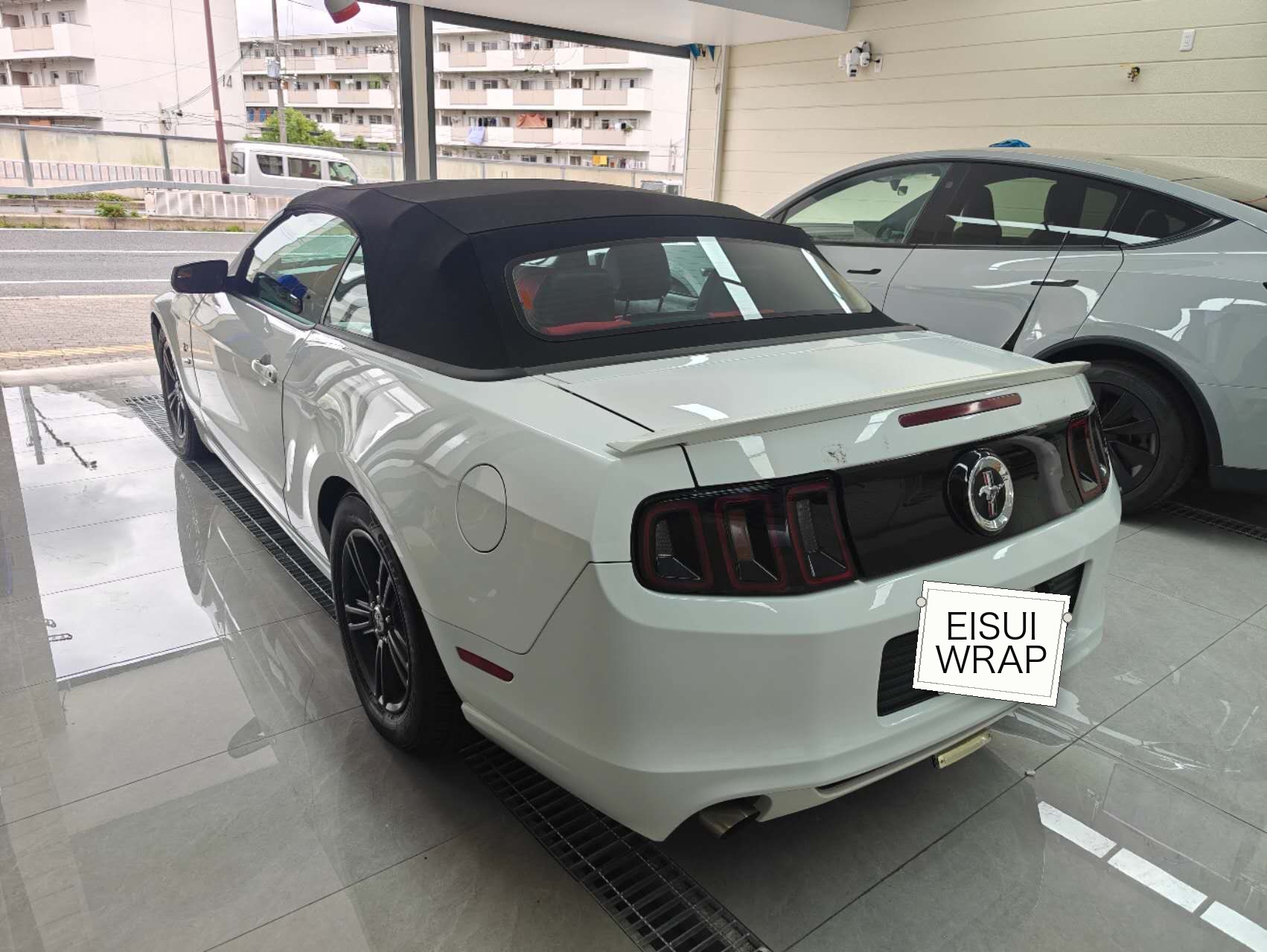 Ford Mustang before wrapping, rear three-quarter view