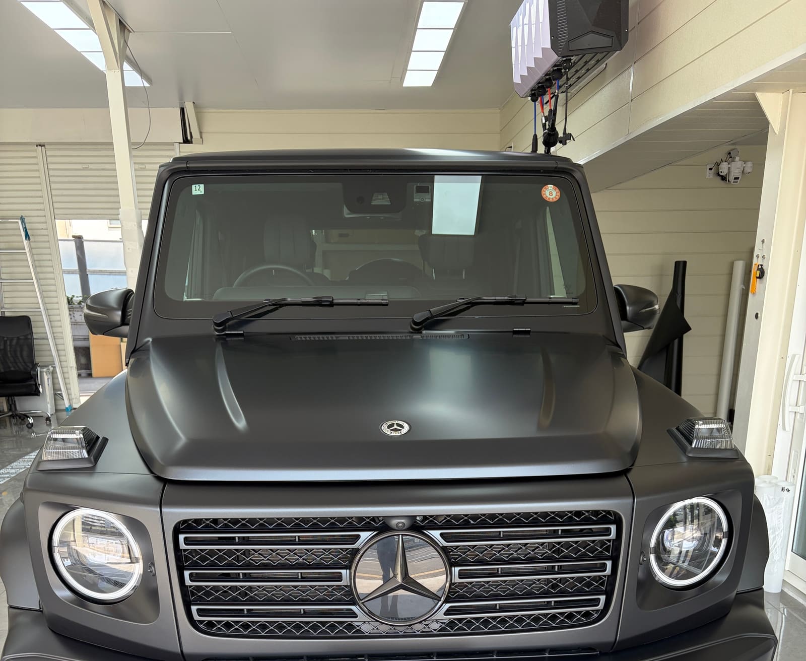 front angle and bumper detail of Mercedes-Benz G400d Matte Paint PPF Front Set by EISUI WRAP Osaka