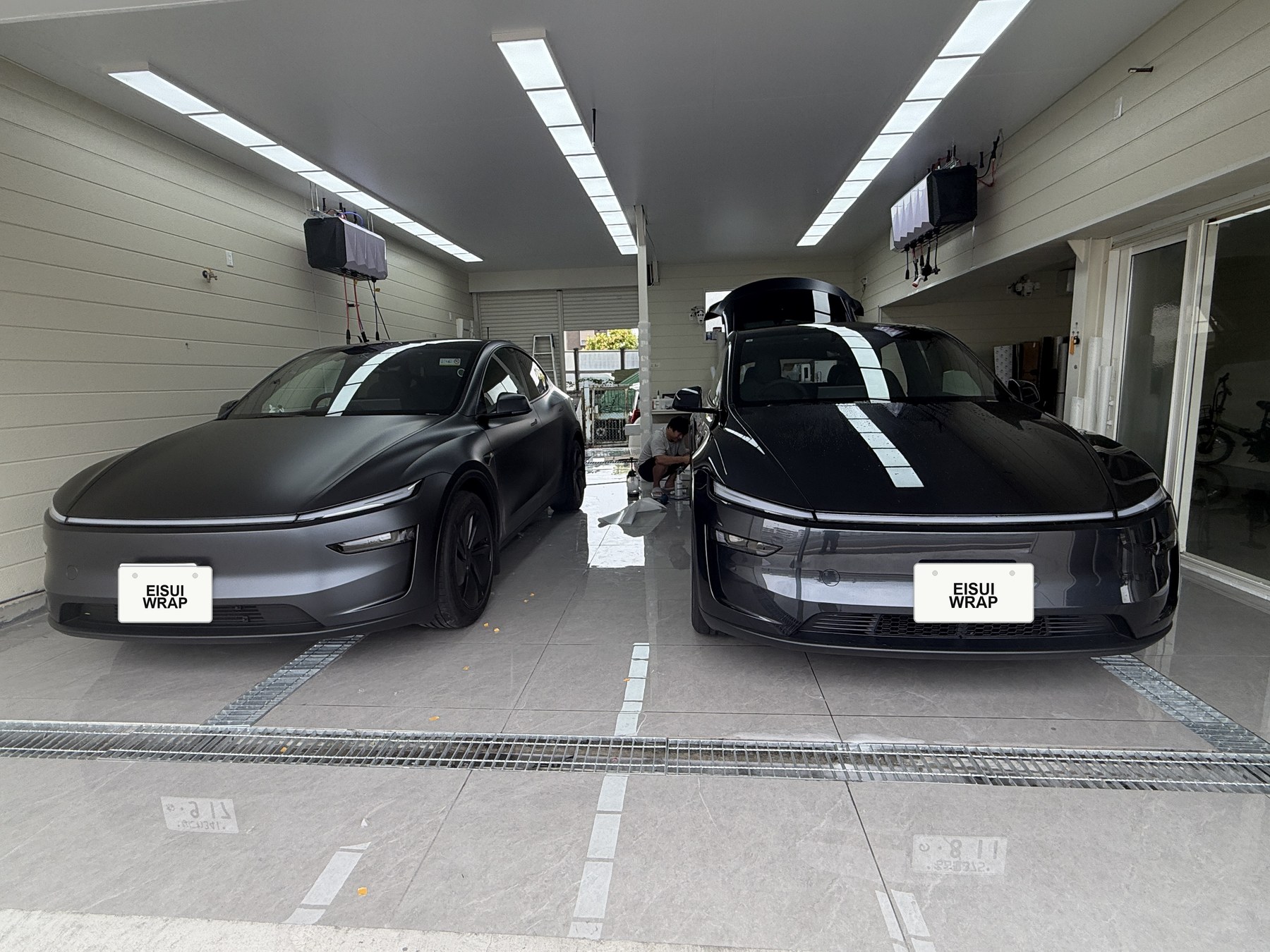 Osaka Suminoe Tesla Model Y dual transparent matte PPF front view with EISUI WRAP plates