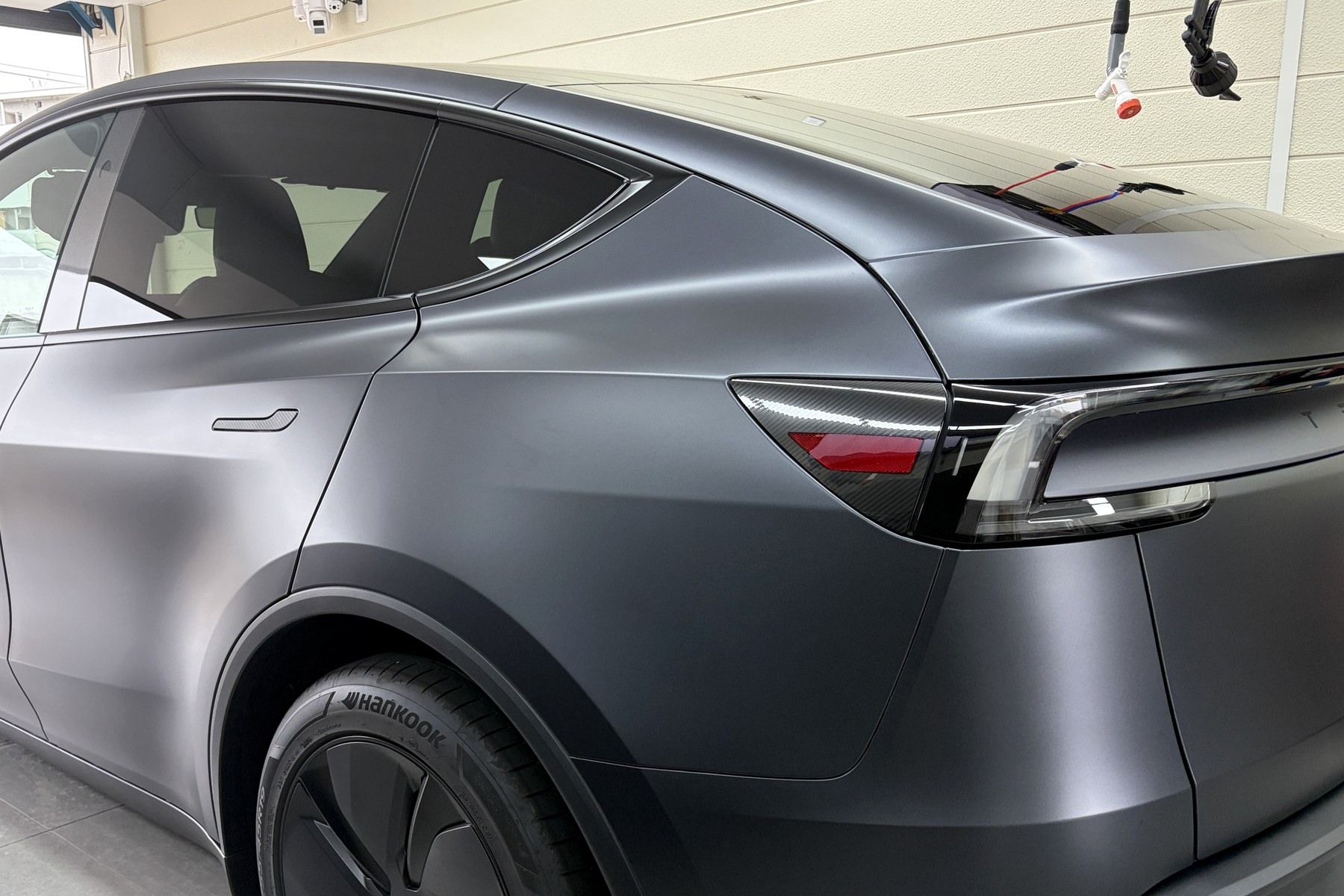 Tesla Model Y transparent matte PPF rear three-quarter view