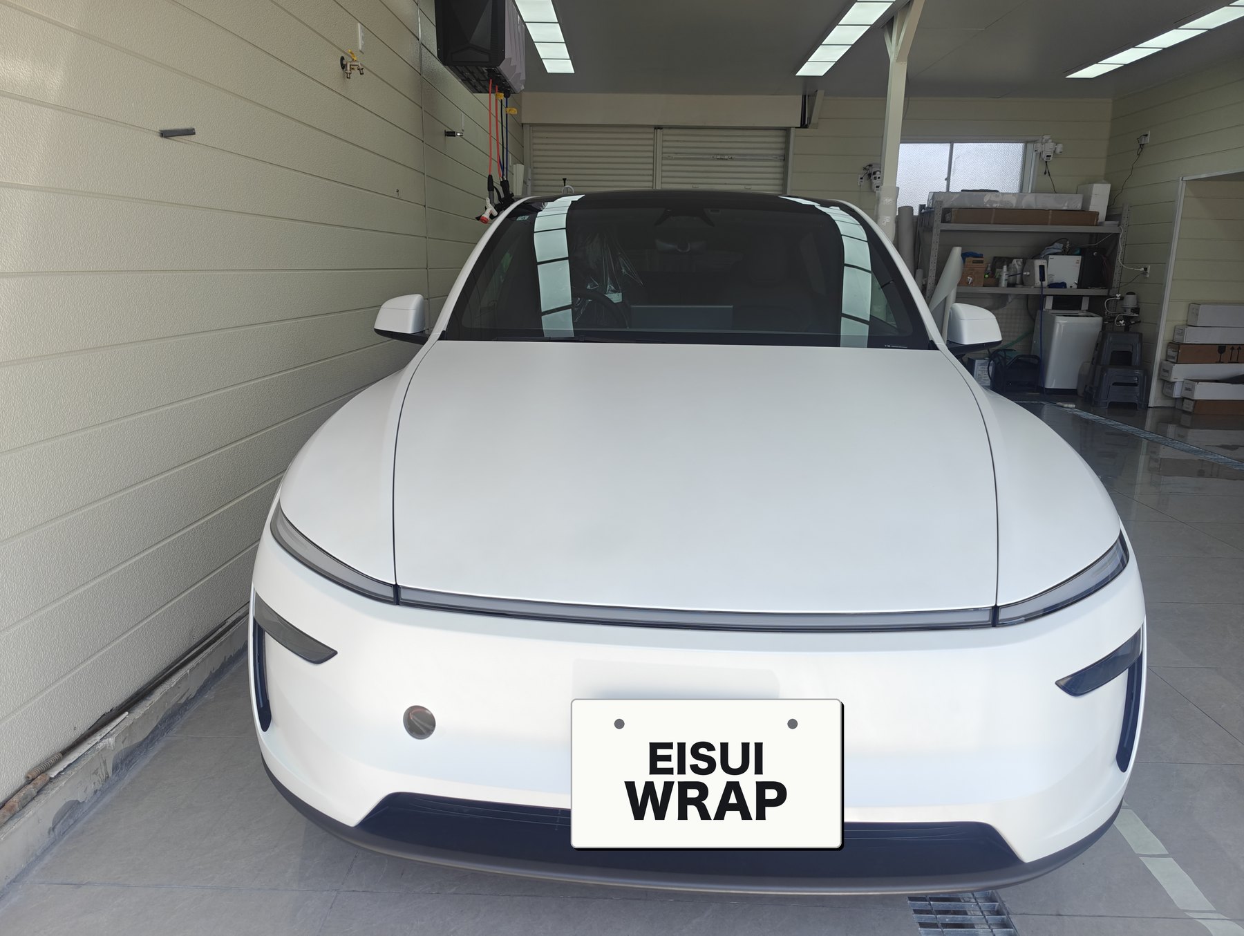 Tesla Model Y after matte clear PPF front view matte white