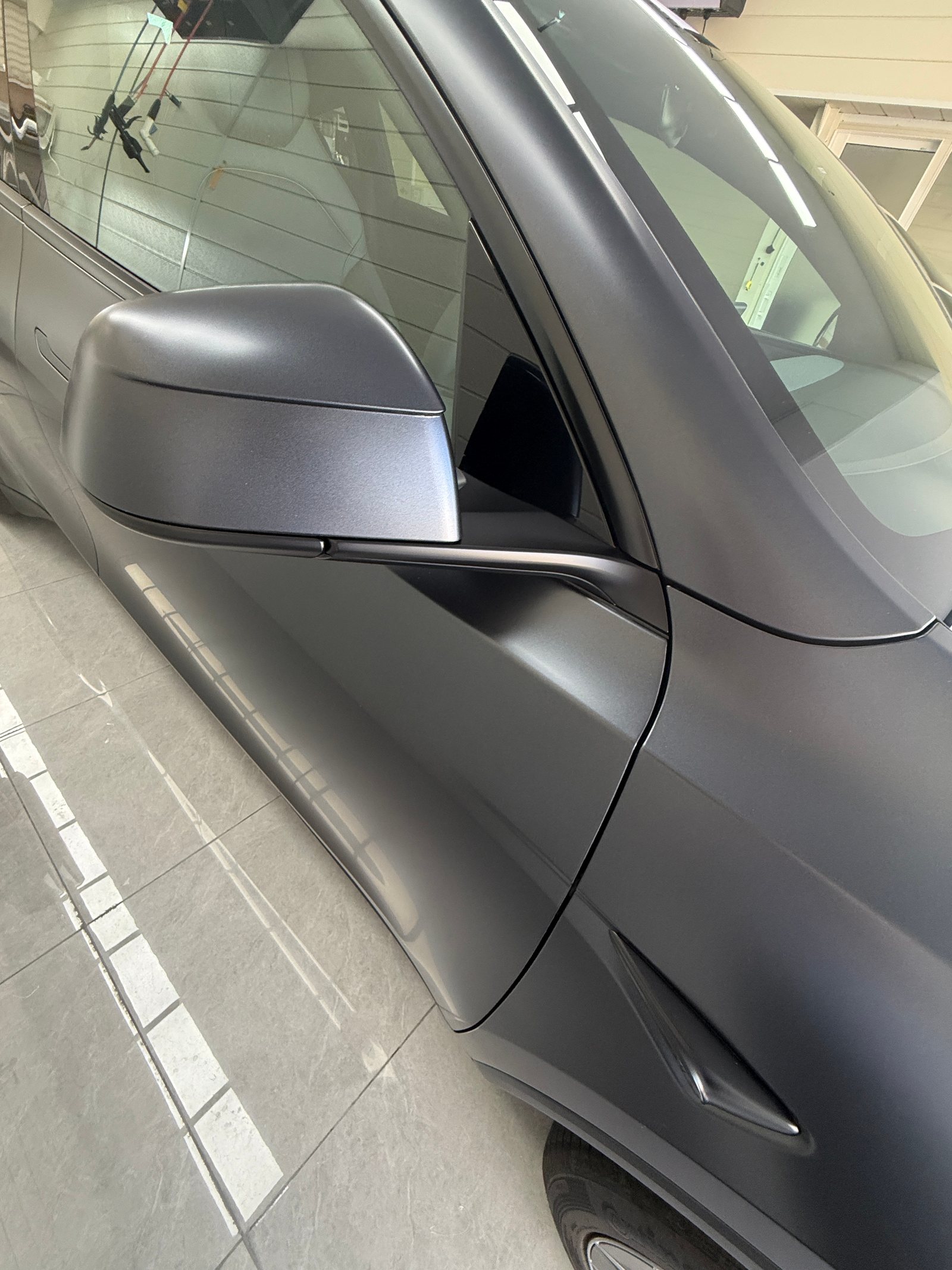 2026 Tesla Model Y L Stealth Grey, After: door mirror and door