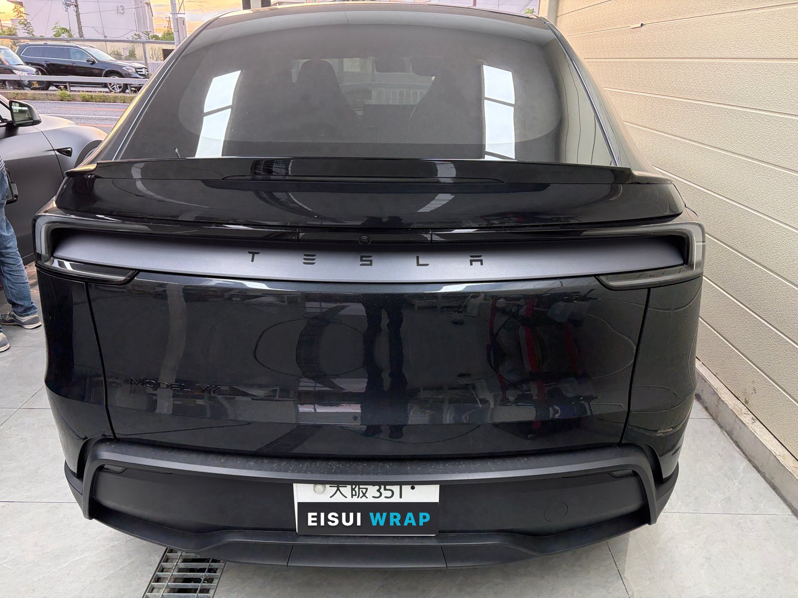 2026 Tesla Model Y L Stealth Grey, Before: rear