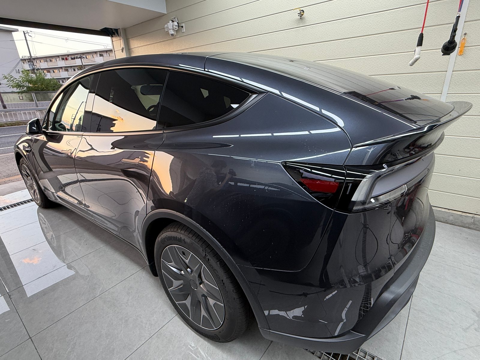 2026 Tesla Model Y L Stealth Grey, Before: rear quarter