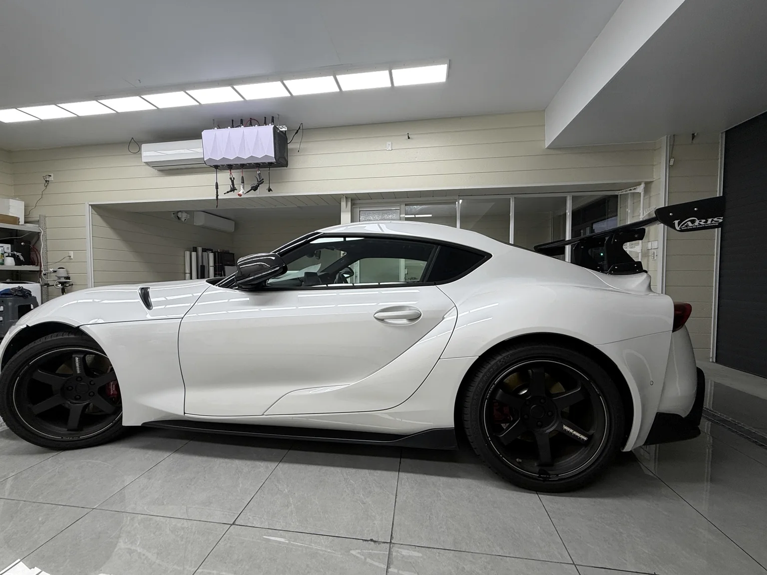 White Toyota GR Supra A90 full side profile after clear PPF installation